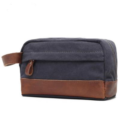 China Dropshipping Men's And Women's Waterproof Waxed Vintage Hanging Toiletry Cosmetic Canvas Travel Waxed Clutch Bag for sale