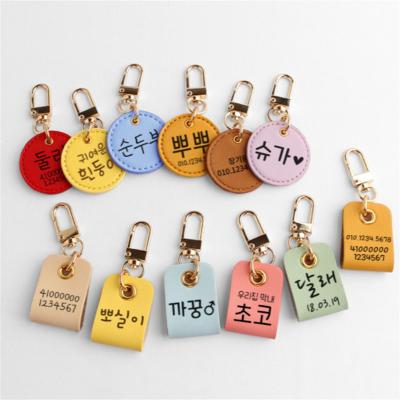 China Souvenir Gifts Promotion Wowei Personalized Engraved Anti-lost Dog Name ID Cat Phone Tag Pendant Pu Leather Tags For Pets for sale