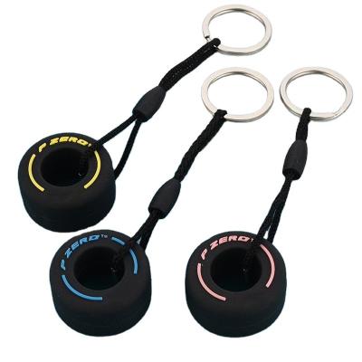 China Fashionable WoWei Mini Cute Racing Tire Wheel PVC Auto Tire Keychains Soft Rubber Key Chains for sale