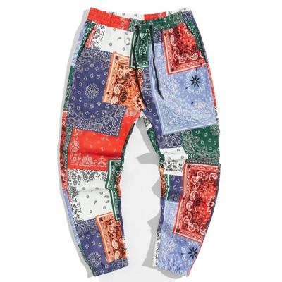 China custom Anti-wrinkle paisley print patchwork sweatpants for men split color satin sweatpants for sale