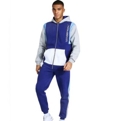 China Fashionable Breathable OEM ODM No Brand Tracksuit Color Block Zipper Hood Tracksuit With Pockets for sale