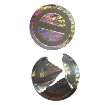 China Anti-Counterfeit Custom Design Holographic Effect Security Hologram Fragile Paper Embossed Sticker With Engraving for sale