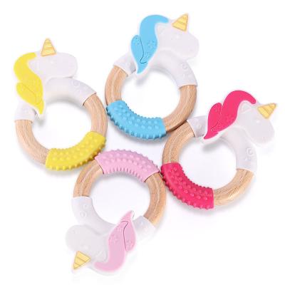 China Hot Sale Food Grade Baby Silicone Teether With Animal Shape Unicorn Food Grade Silicone Ring Easy To Hold Cute Beech Wood for sale