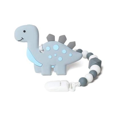 China Soft Toy Baby Toys Rattles Teether Style Soft Blue Teether Chain and Food Grade Silicon Shakers Dinosaur Safe Pink for sale