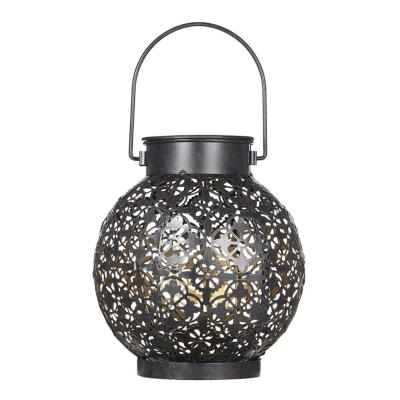 China Retro Yard Garden Lamp Metal Waterproof Solar Hollow Shade Projection Hanging Lantern LED For Outdoor Lighting for sale