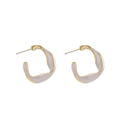 China 2022 hot sale cute c-shaped drop earrings factory price oil irregular spiral geometric earrings for sale