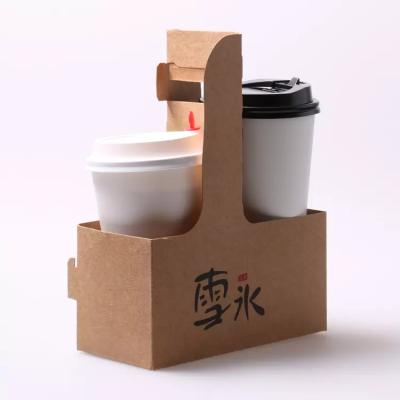 Cina New design custom made high quality recyclable corrugated cardboard printing own logo paper cup holder for carrying beverage coffee paper cup in vendita