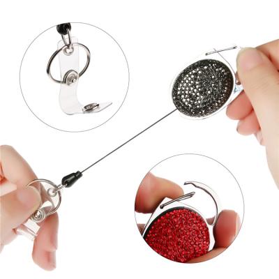 China Heavy Duty Retractable Key Holder Badge Holders Swirl with Rhinestones Crystal Clip Key Ring for sale