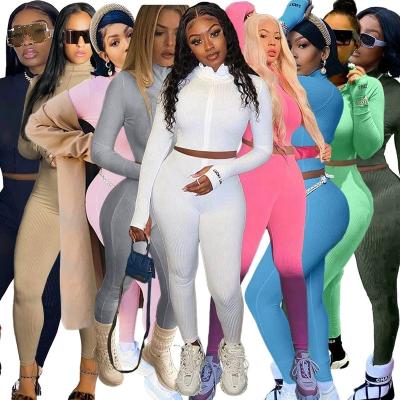 China Pink QUICK DRY Hot Selling Fitness Two Piece Tracksuit Set Tracksuit Women Zip Up Hoodie Crop Top And Pants Matching Set Ladies Skinny Tracksuit for sale