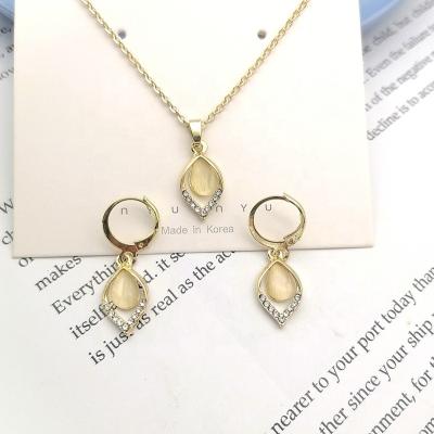 China Tulip Flower Petal Necklace Pendant TRENDY, luxury light micro-inlaid opal ear loop set simple eardrop for women for sale