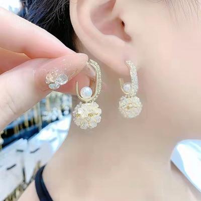 China FASHIONABLE Female Fashion Jewelry Pearl Flower Earrings High-grade Feeling Design Temperament Zircon Zircon Inlay Elegant for sale