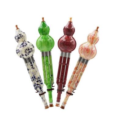 China Chinese Handmade Hulusi Resin With Copper Groove Gourd Metal Musical Instrument C Ethnic Key For Beginner Music Lovers LB-FL04 for sale