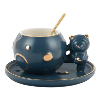 China Cartoon Creative Cute Bear Stocked Ceramic Coffee Mug With Gold Bloated Belly Mugs for sale