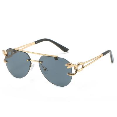 China Frameless Metal Leopard Rimless Sunglasses For Women And Men Double Beam Balanced Toad Gradient Fashion Shades for sale