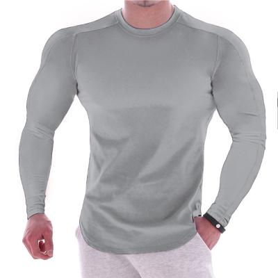 China 2020 New Muscle Fitness Breathable Long Sleeve Stretch Men Fall Winter Bodybuilding Training Base T-shirt Casual Sportswear Plus Size for sale