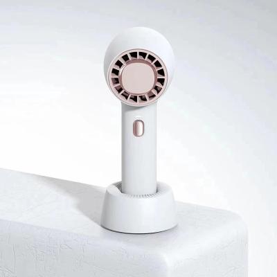 China 2023 Portable Mini Rechargeable Ice Compress Handheld Fans 68*68*170mm for sale