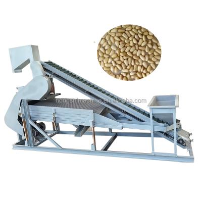 Chine food & Beverage plant processing machine / nut pinion shell removing machine / pinion biscuit sheller cracking machine à vendre