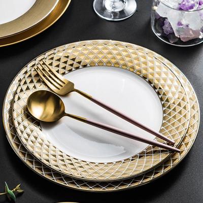 China Luxury Dinner Plates Stocked Dinnerware Sets 10 Inch Gold Plated Ceramic Dishes For Wedding Restaurant Hotel for sale