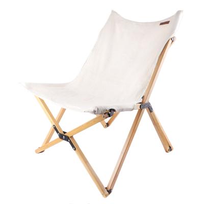 China Durable Stable Bamboo Canvas Folding Lounger Accent Wooden Chair For Sun Camping Fishing for sale