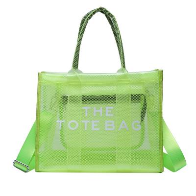 China Swap Ladies Tote Bags Solid Color Hand Transparent Bags Large Mesh Design Shoulder Bag for sale