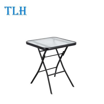 China FOLDABLE Hot Selling Black Glass Dining Table / Tempered Glass Table for sale