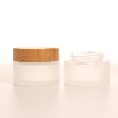 China Personal Skin Care Packaging 50ml Love Luxury Empty Cosmetic Packaging Low Price Round Face Cream Glass Jar In Stock for sale