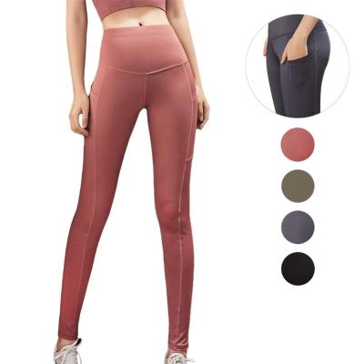 China Antibacterial Women's High Waisted Sports Gaiters Yoga Quick Dry Pants Seamless Running Skinny Legging With Pockets for sale