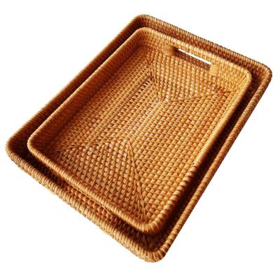 China Minimalist High Quality Handmade Rectagular Food Storage Basket Hotel Rattan Serving Tray With Handle for sale