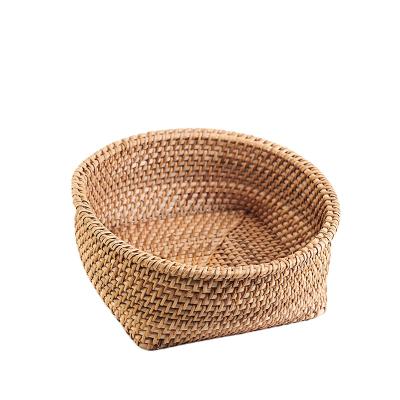 China Autumn Sustainable Natural Rattan Handwoven Desktop Cosmetics Finishing Fruit Bread Snacks Storage Basket for sale