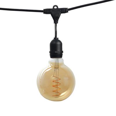 China Wholesale Residential Led Filament Bulb G125 Amber Glass Decorative Globe Soft Spiral Led Filament Lamp for sale