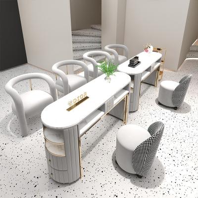 China Modern Luxurious White Nail Art Table Practical Multifunctional Manicure Table and Chair Set Combination for sale