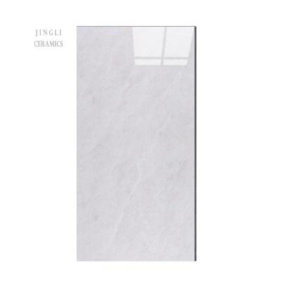 China Low Price Modern Wall Tiles Interior Glazed Ceramic Marble Texture 300x600mm And Wood Texture for sale