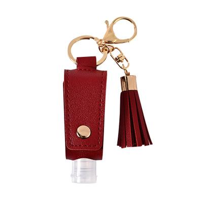 China PU Leather Empty Bottle Key Chain Set Sanitizer Hand Tassel Key Chain for sale