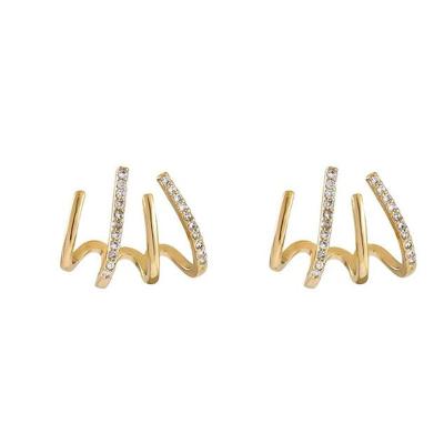 China Unique Fashion Luxury Minimalist Crystal Claw Illusion Stud Earrings Optical Illusion Stud Earrings For Girls for sale