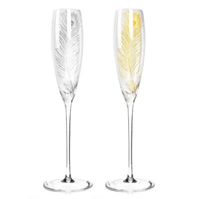 Cina Made In China Decorative Glassware Golden Feather Champagne Flutes Glass Gift in vendita