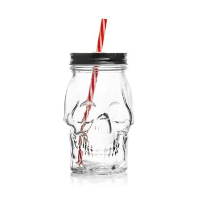 China Popular products 17oz custom made glass skulls shaped 510ml mason jar with llid and straw for sale