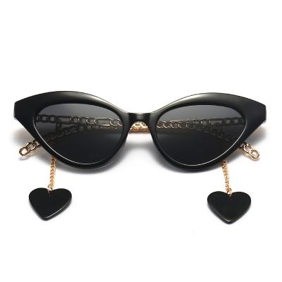 China High quality cat eye decoration street shooting pattern ladies narrow chain sunglasses retro for sale