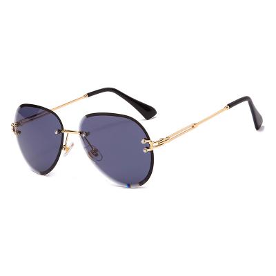 China Rimless Sunglasses Diamond Fashion Sunglasses Ocean Piece Toad Sunglasses Fashion Sunglasses for sale