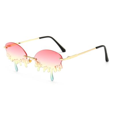 China 2020 Super Hot Fashion Eyewear A0422 Rimless Fire Rimless Drip Tinted Shape Women Ladies Sunglasses for sale