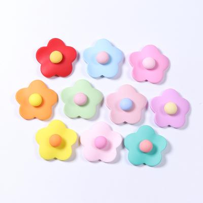 China China Hot Selling Bulk Kawaii Charms Five Petal Flower Children's Resin Mud Charm Crafts For Phone Charm for sale