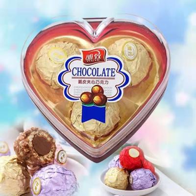 China Wholesale Golden Ball Children's Cocoa Butter Chocolate Products T3 Leather Chocolate Chip Sandwich Chocolate Christmas Gift for sale