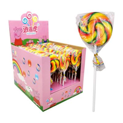 China Natural Colorful Fruity Lollipop Waves Swirl Sweet Christmas Rainbow Lollipops for sale