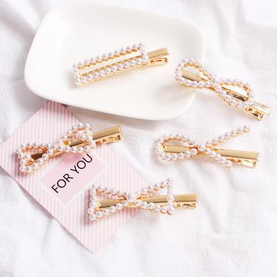 China Japanese and Korean fashion simple pearl style lady heart girl hair accessories cute hairpin for sale