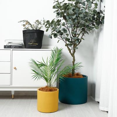 China Modern Design Decor Flower Pots Modern Chinese Cute Bulk Outdoor Round Planters for sale