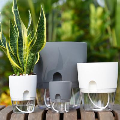 China Modern Decor Table Amazon Garden Self Watering Plant Planter Indoor Plastic Flower Pots for sale