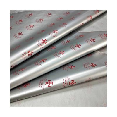 China Custom Biodegradable Silver Color Full Logo Tissue Wrapping Paper For Red Wine Wrapping Paper for sale