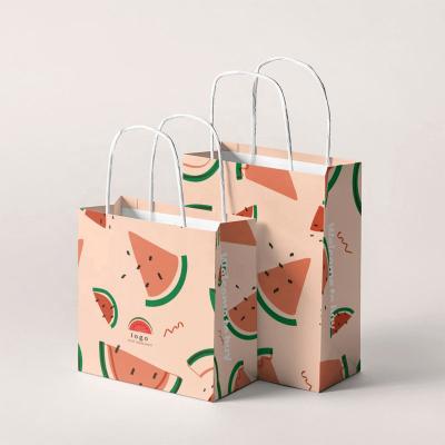 China Custom Printed Materials Recycled Christmas Kraft Paper Handle Shopping Bag Logo Friends Give Gift Halloween for sale