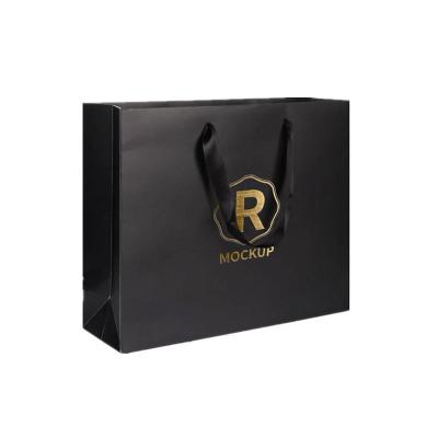 China Recycled Materials Custom Printed Logo Luxury Matt Black Shopping Paper Gift Bags Packaging With Ribbon Handle for sale