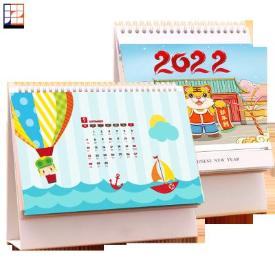 China Promotional Customized Monthly Desk Calendar 2022 With Stand A5 Size Chinese Hong Kong Holiday Printing for sale