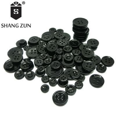 China Viable High-Grade Obsidian 4 Hole Button Clothing Accessories Natural Stone Buttons Natural Jade Buttons for sale